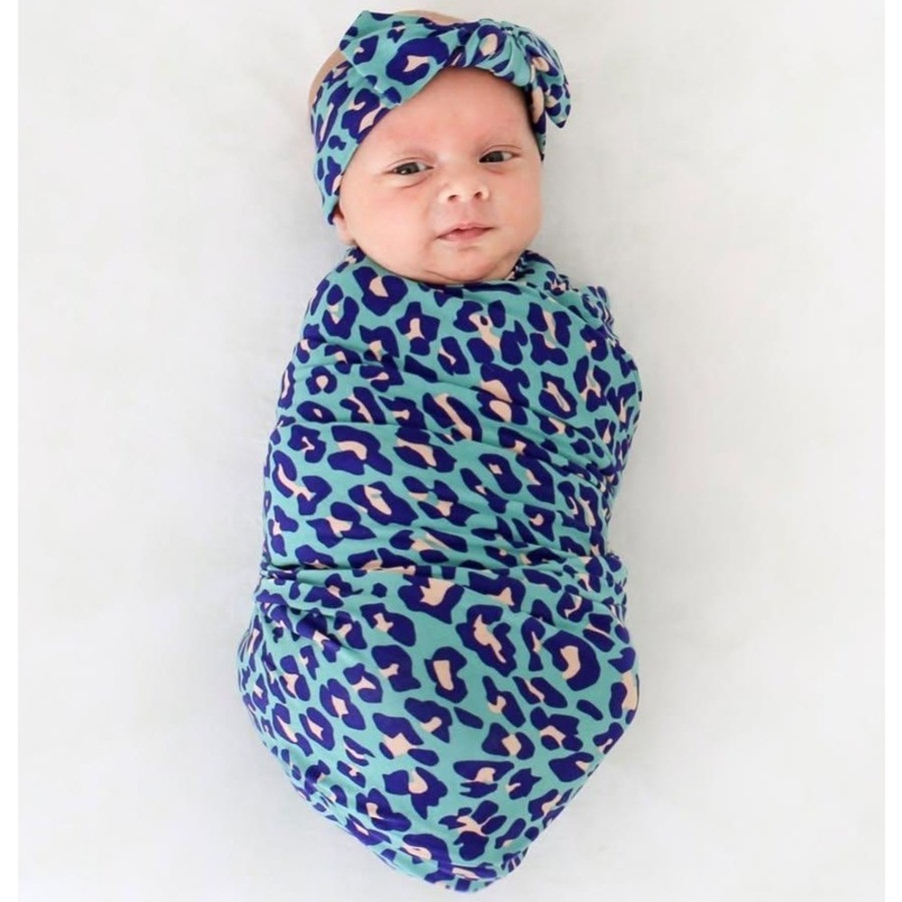 Post Peanut Bamboo Swaddle in Teal Lana Leopard Print